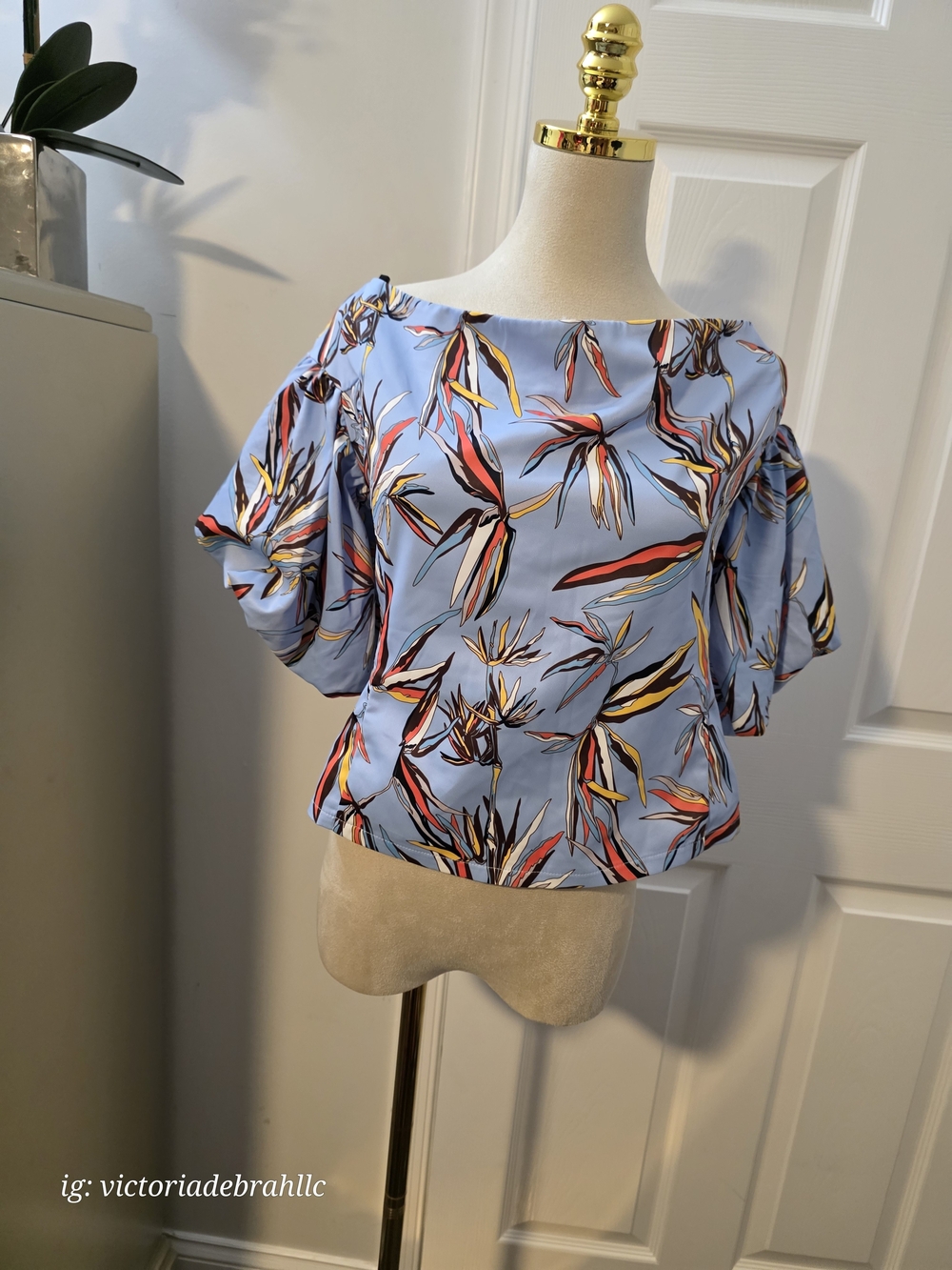 L'ATISTE Light Blue Floral Boatneck Blouse with Puff Sleeves